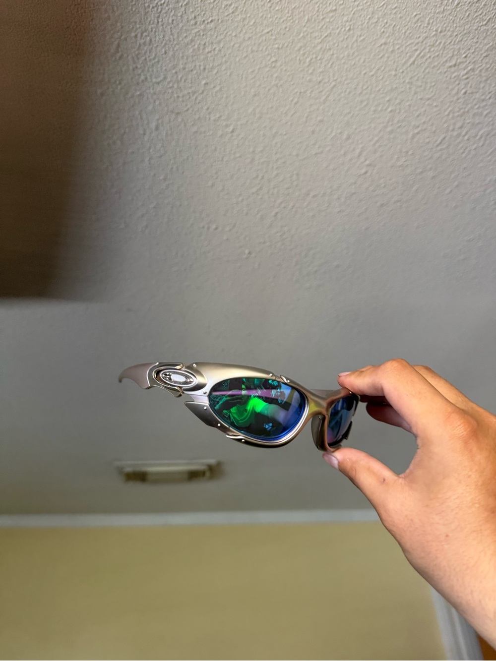 Oakley Silver Frame with Green-Blue Mirrored Lenses Sunglasses